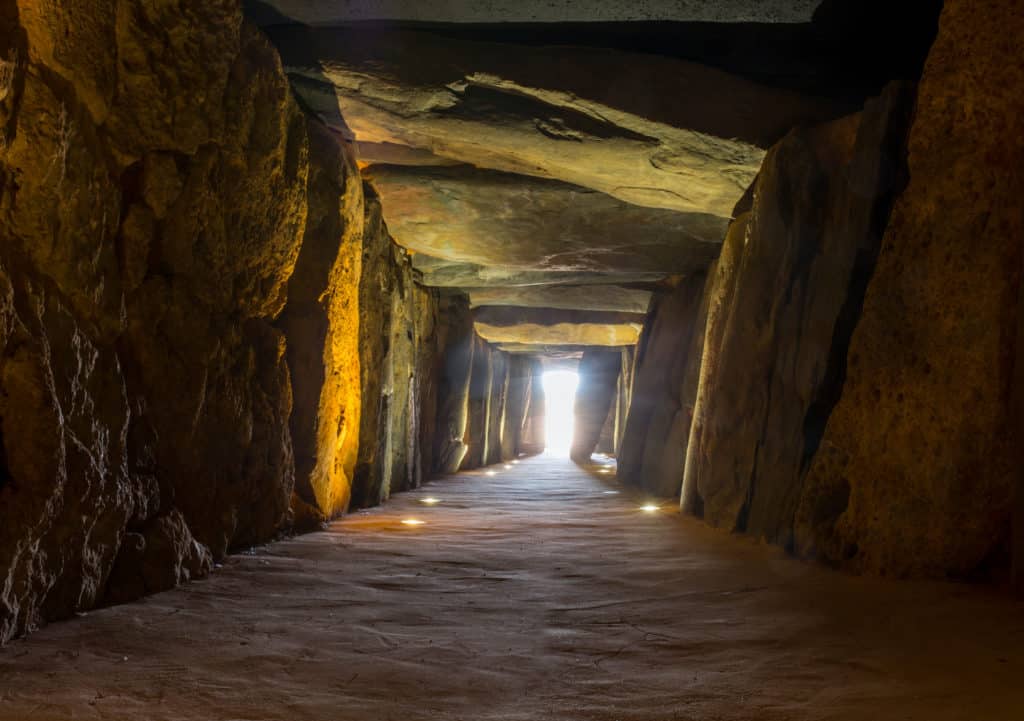 Sun rays entering at Dolmen de Soto chamber. Sun-aligned megalithic monument, Trigueros,Spain